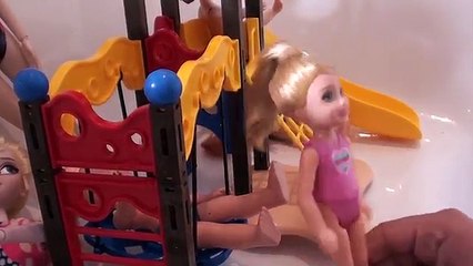 Elsa and Anna toddlers have a milk bath and play in the water with their friends at the waterpark