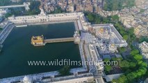 Fly over Amritsar: Golden Temple, old city, railway station and trains from the air