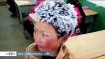 Un enfant chinois arrive avec les cheveux gelés en classe et déclenché un énorme élan de solidarité - Regardez