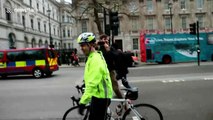 Angry Brexiteers steal cyclist's EU flag at demo