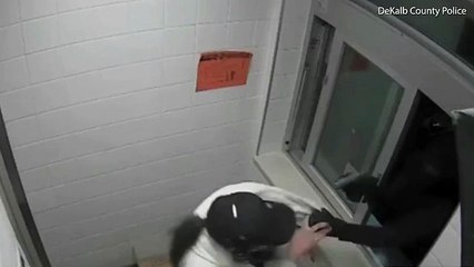 Armed robber sticks his gun through McDonald's drive-thru