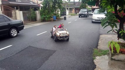 Jk and Shaki drive their Mini Cooper