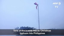 Tens of thousands flee as Christmas typhoon
