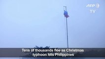 Tens of thousands flee as Christmas typhoon hit