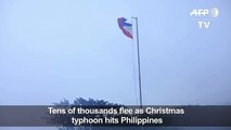 Tens of thousands flee as Christmas typhoon hits Philippines