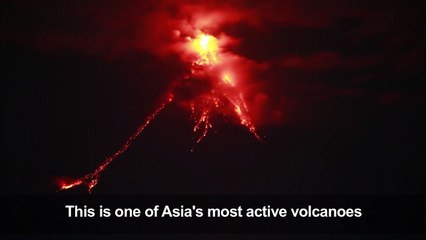 Tens of thousands flee as lava oozes from Philippine volcano