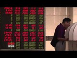 China's stock market halts trading after nosediving 5% within minutes, U.S. markets open lower