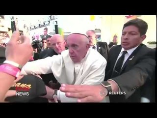 Pope Francis becomes irritated after Mexican well-wishers pull hard at his sleeve