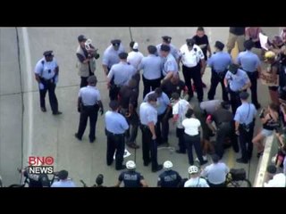 Hundreds march in Philadelphia to protest fatal Alton Sterling police shooting