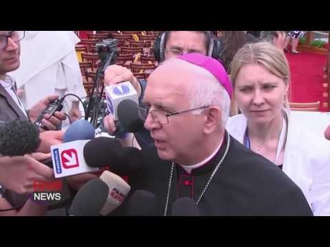 Pope Francis misses step and falls to ground at Poland mass