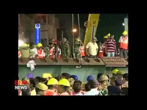 India bridge collapse kills 14; scores feared trapped