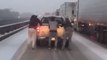 People Cling to Moving Pickup Truck and 'Ski' on Frozen Interstate in Louisiana