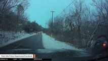 Watch Car Hit Police Cruiser After Sliding On 'Black Ice'