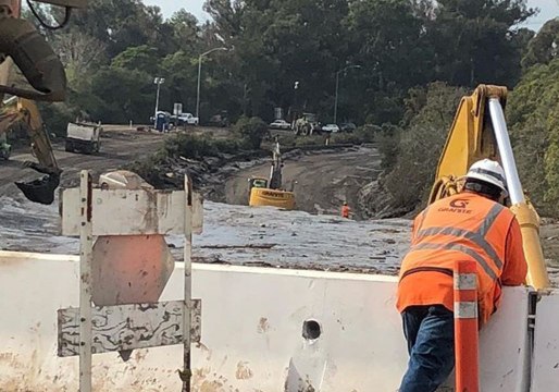 Crews Continue Digging Out a Flooded 101 Freeway