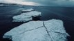 Aerial Footage Captures Lake Michigan Icebergs and Lighthouse