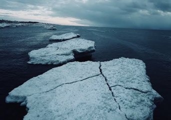 Download Video: Aerial Footage Captures Lake Michigan Icebergs and Lighthouse