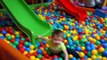 Baby Playground Fun for Kids with Balls Children playing in the indoor playground-