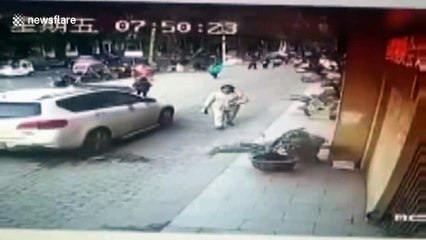 Glass window drops from fourth floor hits woman