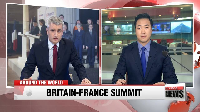 Leaders of Britain and France meet to boost ties amid Brexit talks