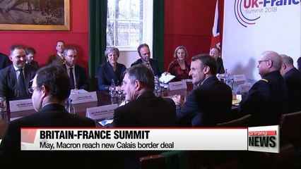 Leaders of Britain and France meet to boost ties amid Brexit talks