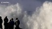 Big wave surfers ride monster swell off Nazaré