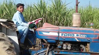 kid tractor driving stunt & hevy loaded tractor on road tractor videos 2018