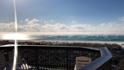 Amazing Sunrise over the Beach During an Icy Winter