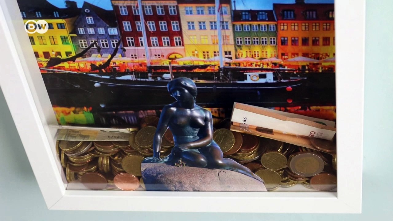 Urlaubskasse aus einem Bilderrahmen | DW Deutsch