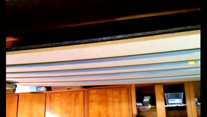 Ceiling mounted plywood or MDF holder in your shop