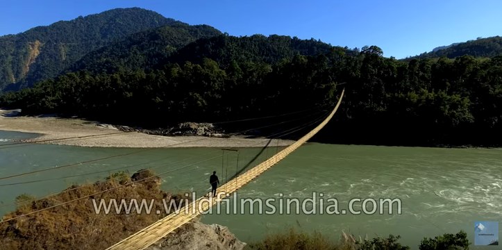 Aerial journey over Hanging bridge on massive Brahmaputra river in north-east India
