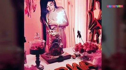 Urwa Hocane Cutting Her Birthday Cake with Husabnd Farhan Saeed