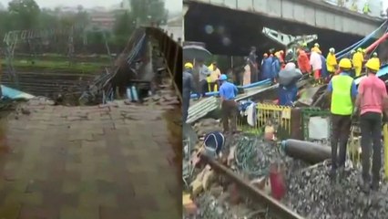 கடும் மழையினால் மும்பையில் நடை மேம்பாலம்  உடைந்து விபத்து- வீடியோ