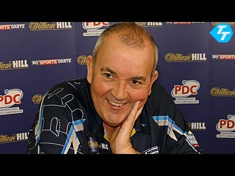 Phil Taylor cruises into the second round