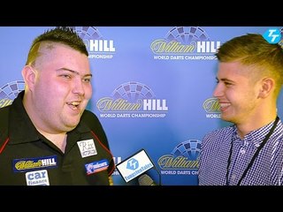 Michael Smith eases into the second round 3 - 1 over Mensur Suljovic