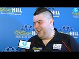 Michael Smith wakes up to beat Brendan Dolan 4-2 at The Worlds