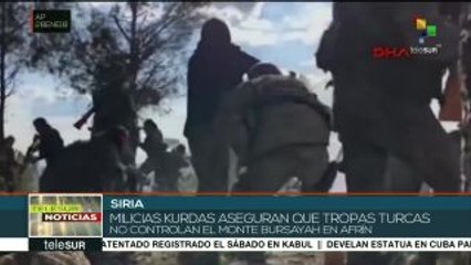 Kurdos y turcos se enfrentan en Afrín por el control del monte Bursaya