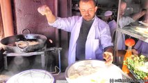 Street Food of Marrakech, Morocco. Fried Fish, Aubergines and Pepper