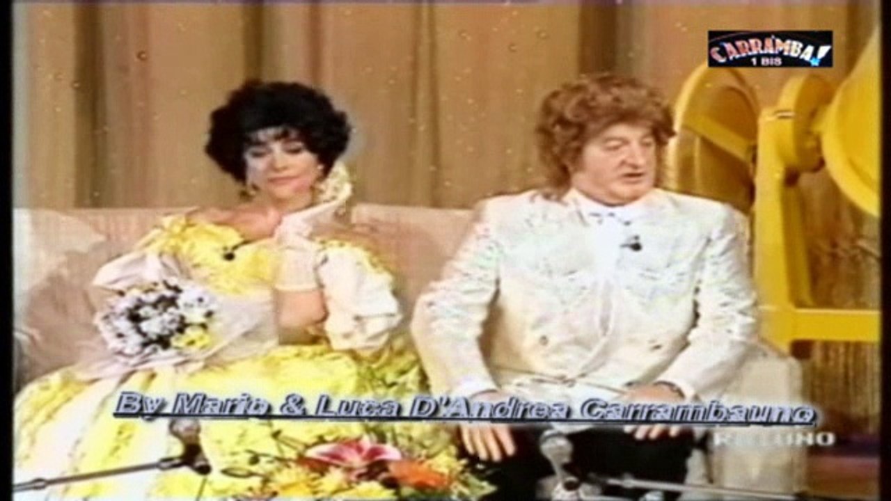 R Carrà G D'Angelo✰ In  Liz Taylor e Larry Fortensky✰ By Mario & Luca D'Andrea Carrambauno