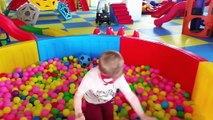 Indoor playground with many toys for kids. Little spiderman adventures. Cool fun