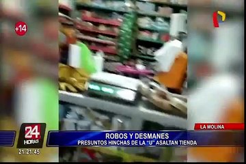 Скачать видео: Robos y desmanes: presuntos hinchas de la “U” asaltan tienda en La Molina