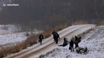 Rally car narrowly avoids spectators who think race is over