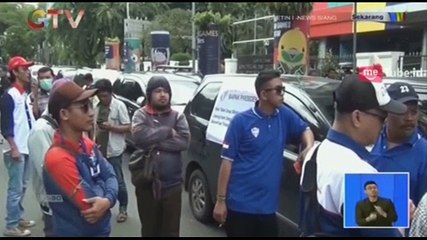 Tarik Ulur Aturan Taksi Online