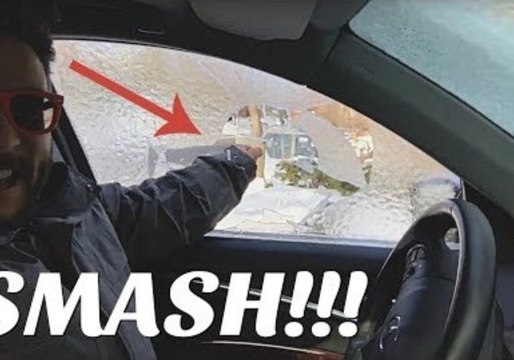 Guy Smashes Frozen Window in an Extremely Satisfying Way