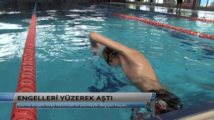 ENGELLERİ YÜZEREK AŞTI