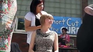 Blonde girl headshave for charity