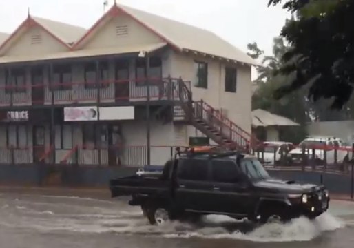 Motorists Drive Through Floodwaters in Broome