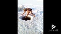 Ce papy plonge à 20m de profondeur dans ce lac gelé par -40°C et remmène un insecte!