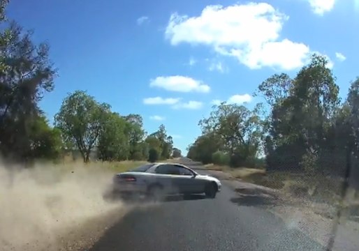 Overtaking Car Spins Out of Control on Outback Queensland Road