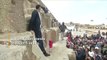 The world's tallest man and shortest woman visit the Pyramids of Giza in Egypt