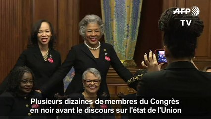 Des membres du Congrès en noir avant le discours de Trump
